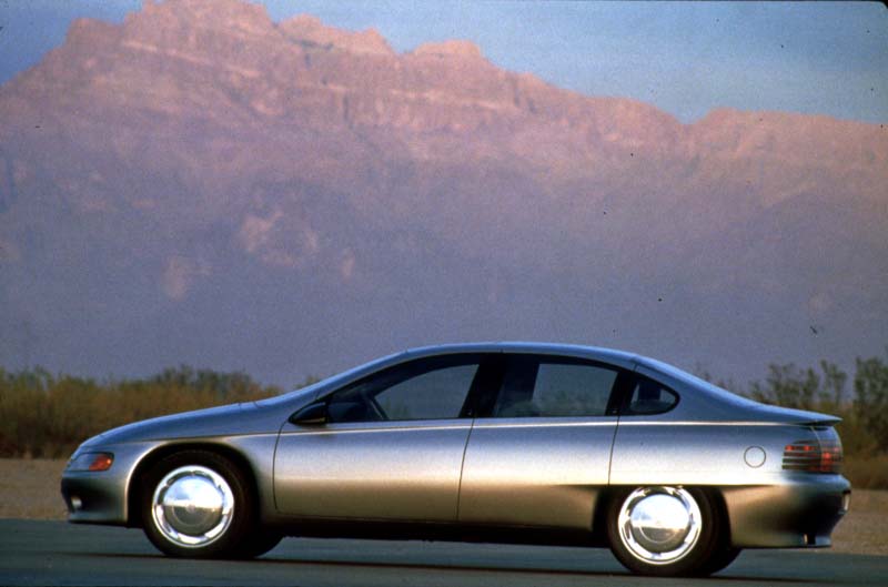 1990_Aurora_12.jpg - [de]1990 Aurora. Die viertürige Limousine in sehr gerundetem Design besass eine konsequente Keilform[en]Aurora’s soft-wedge-shape 4-passenger body featured a sunroof with adjustable tint
